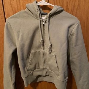 Sage green cropped sweatshirt. Brandy Melville. New with tags. never worn